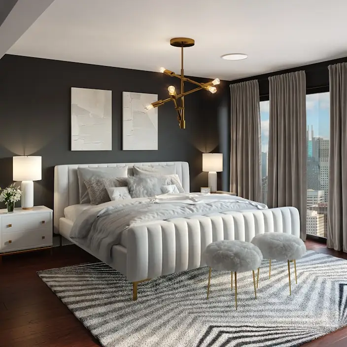 Primary bedroom with charcoal feature wall and brass chandelier